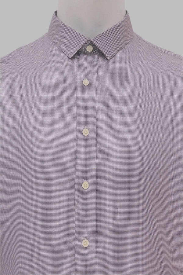 Purple checkered shirt on a mannequin with a gray background